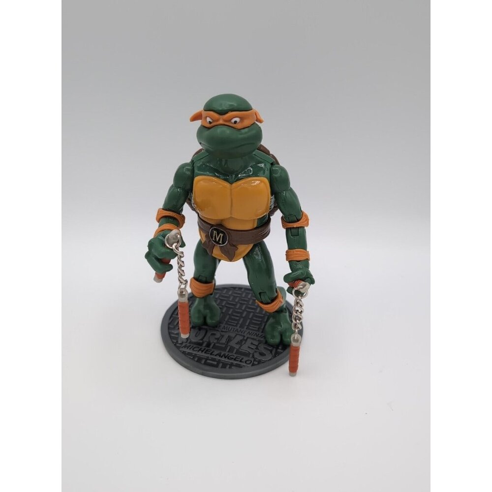 TMNT 7" Action Figure Michelangelo Teenage Mutant Ninja Turtles with Weapons